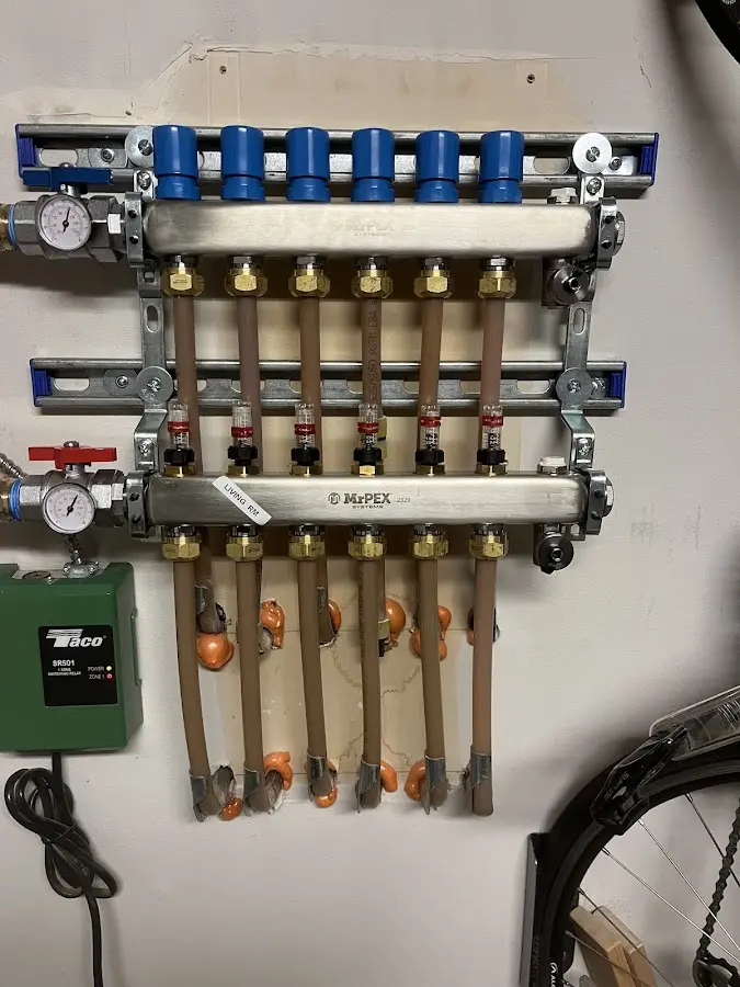 Plumber performing Gas Leak Detection at a residential property in Swansboro